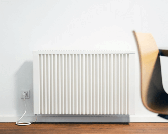 Voorbeeld van een Thermify elektrische radiator in een werkkamer. Getoond model: Elektrische radiator 1300 Watt.